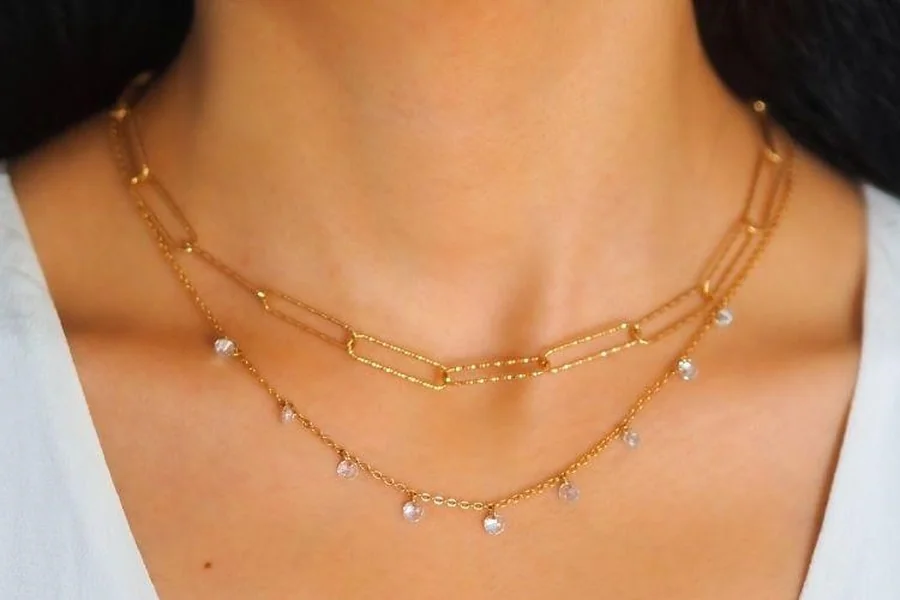 Necklaces accumulation on a woman neck